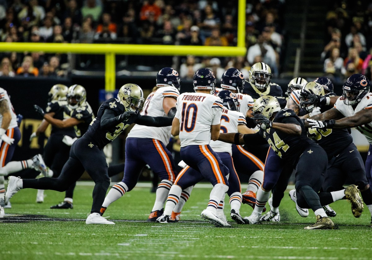 Oct 29, 2017; New Orleans, LA, USA; Chicago Bears quarterback Mitchell Trubisky (10) is sacked by New Orleans Saints safety Kenny Vaccaro (32) and defensive end Cameron Jordan (94) during the first half of a game at the Mercedes-Benz Superdome. Mandatory Credit: Derick E. Hingle-USA TODAY Sports
