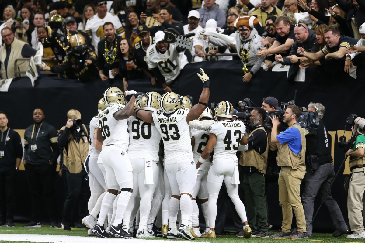 Jan 5, 2020: The New Orleans Saints defense celebrates with fans after a fumble recovery against the Minnesota Vikings.