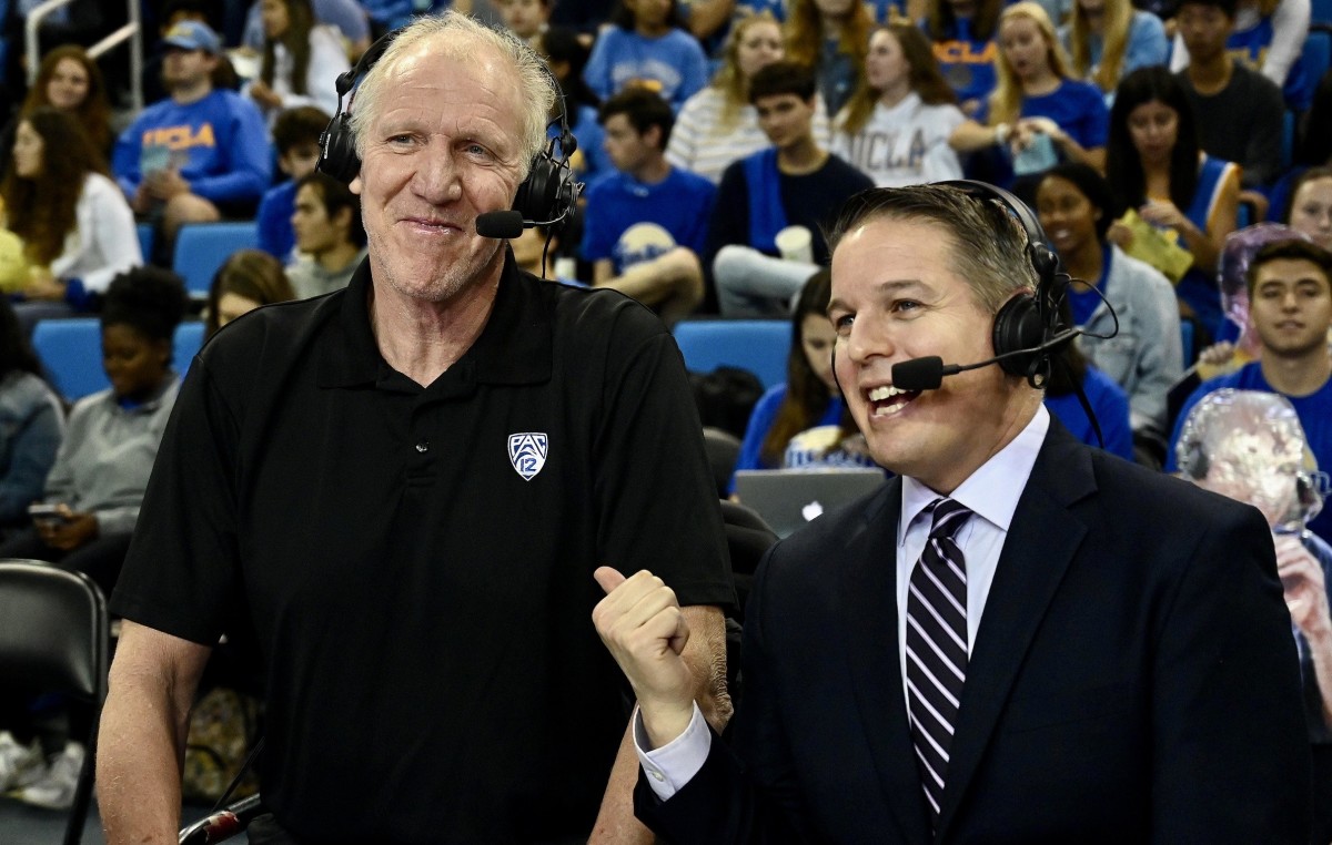 Roxy Bernstein, right, and Bill Walton share a smile during a broadcast.