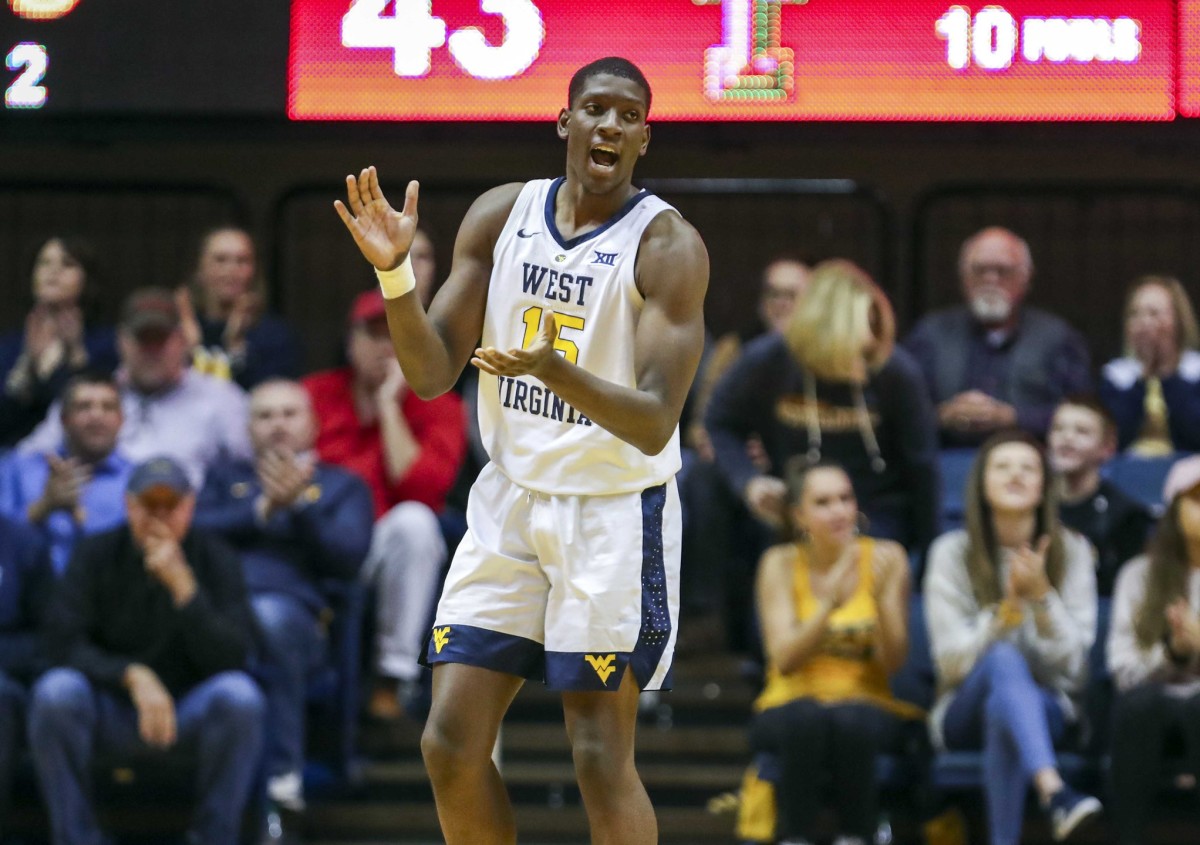 West Virginia Mountaineers forward Lamont West (15) celebrates after a three pointer during the second half against the Texas Tech Red Raiders at WVU Coliseum.