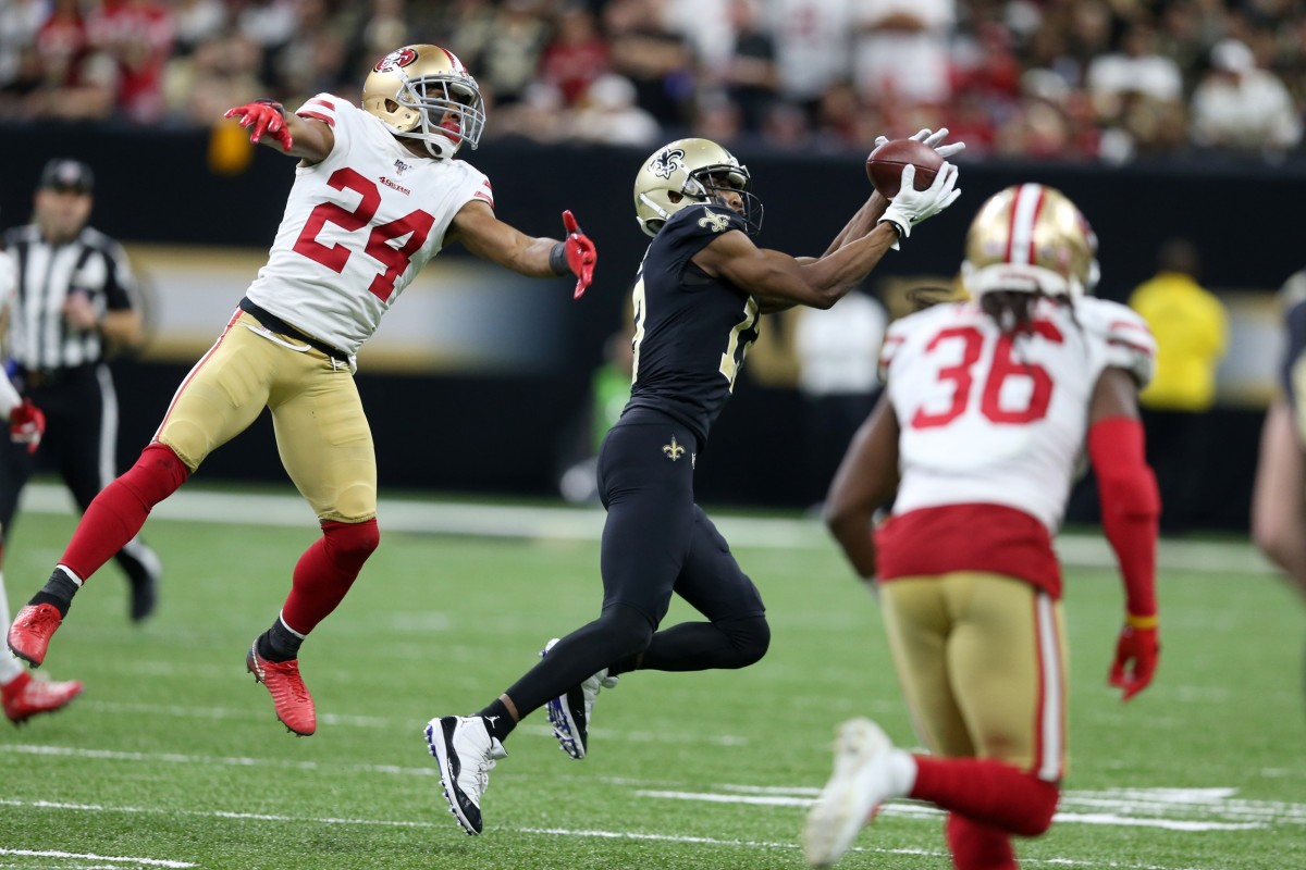 Dec 8, 2019; New Orleans, LA, USA; New Orleans Saints wide receiver Michael Thomas (13) makes a catch as San Francisco 49ers defensive back K'Waun Williams (24) defends in the second half at the Mercedes-Benz Superdome. Mandatory Credit: Chuck Cook-USA TODAY Sports