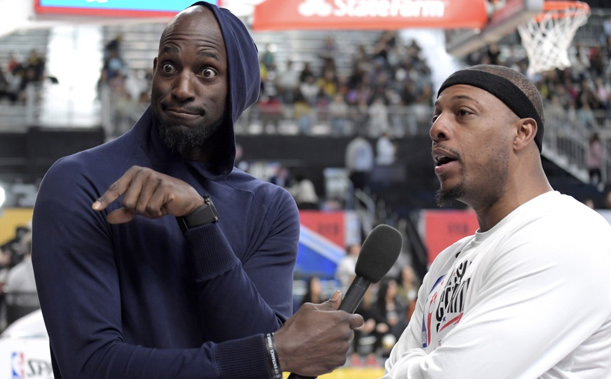 Kevin Garnett, left, in a playful moment with former teammate Paul Piece