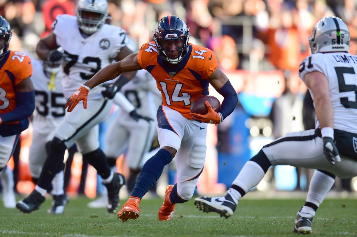 Dec 29, 2019; Denver, Colorado, USA; Denver Broncos wide receiver Courtland Sutton (14) runs after a reception in the second quarter against the Oakland Raiders at Empower Field at Mile High. Mandatory Credit: Ron Chenoy-USA TODAY Sports