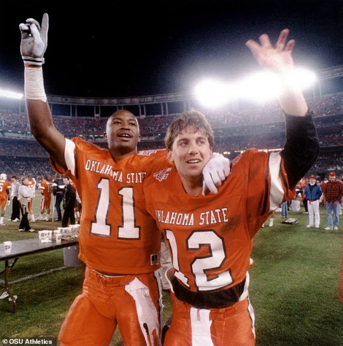 Dykes and Gundy posed for this iconic picture in the late moments of the 62-14 1988 Holiday Bowl win over Wyoming.  