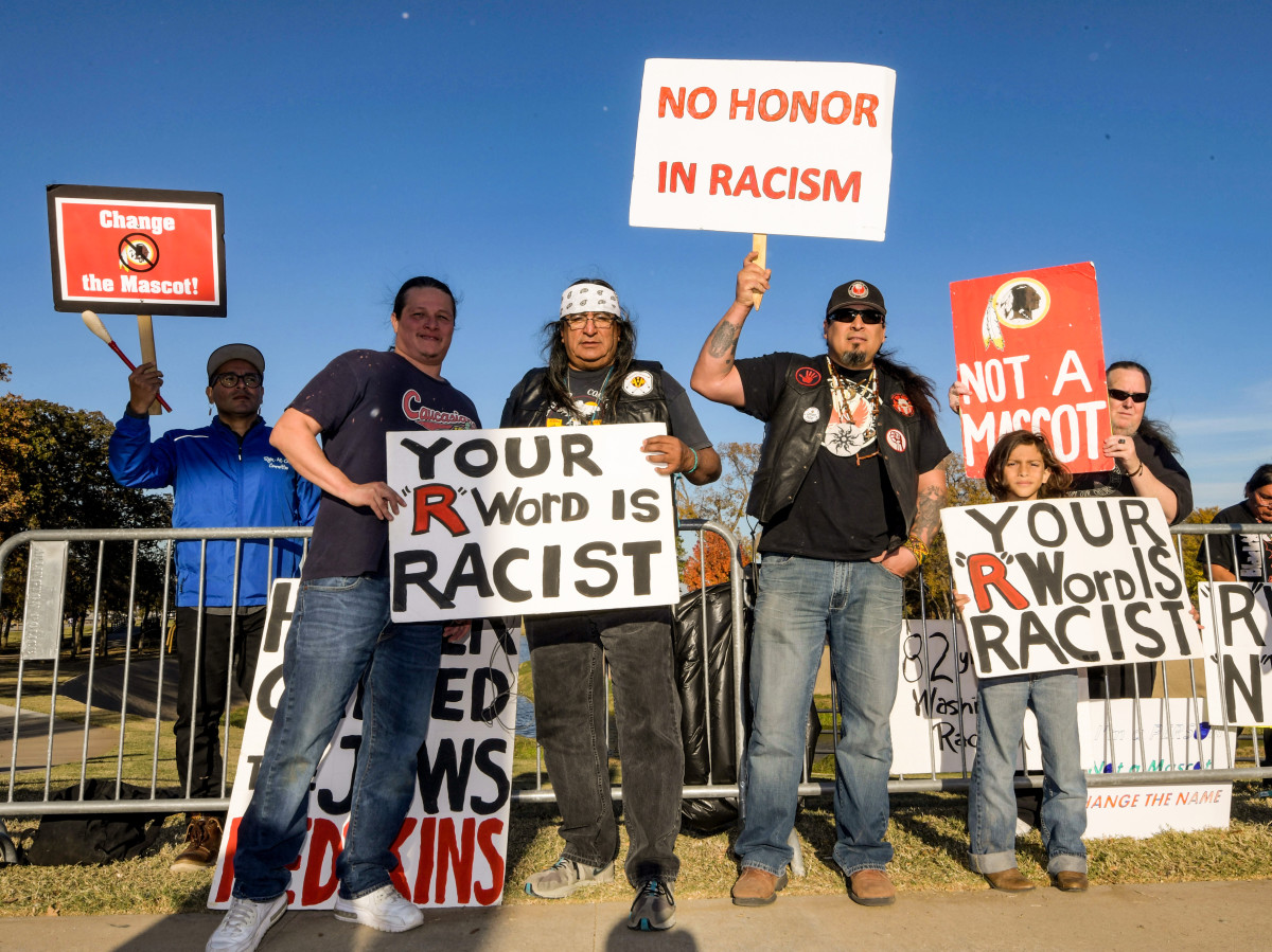 Protests of the Washington team name have become commonplace—this one from 2017 occurred outside a game against the Cowboys in Arlington, Texas.