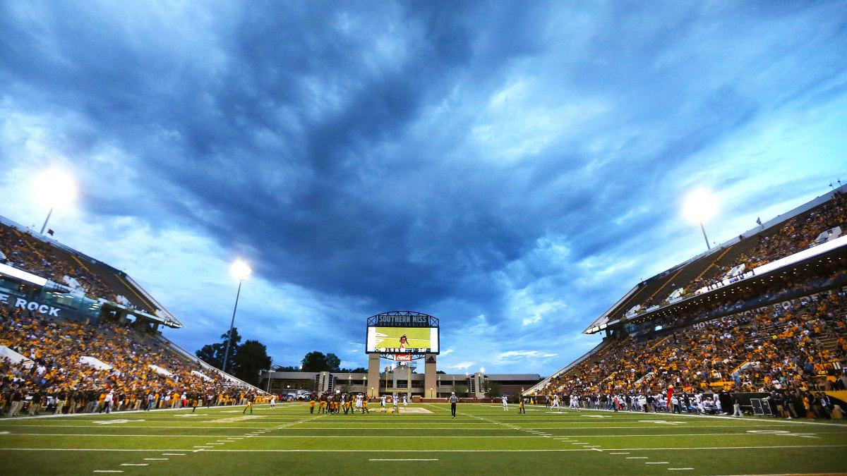 Storm clouds above a college football game from 2018