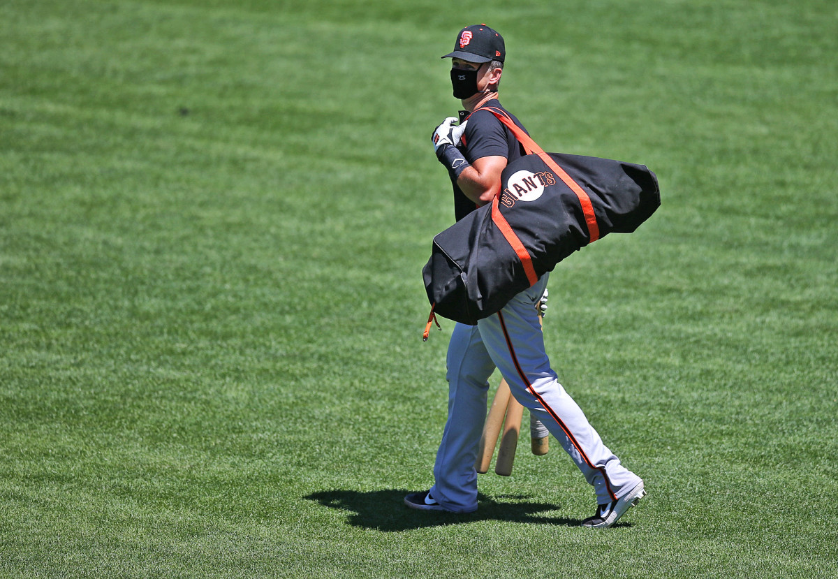 Buster Posey's Giants were among the teams that had to cancel practice this week because of testing delays.