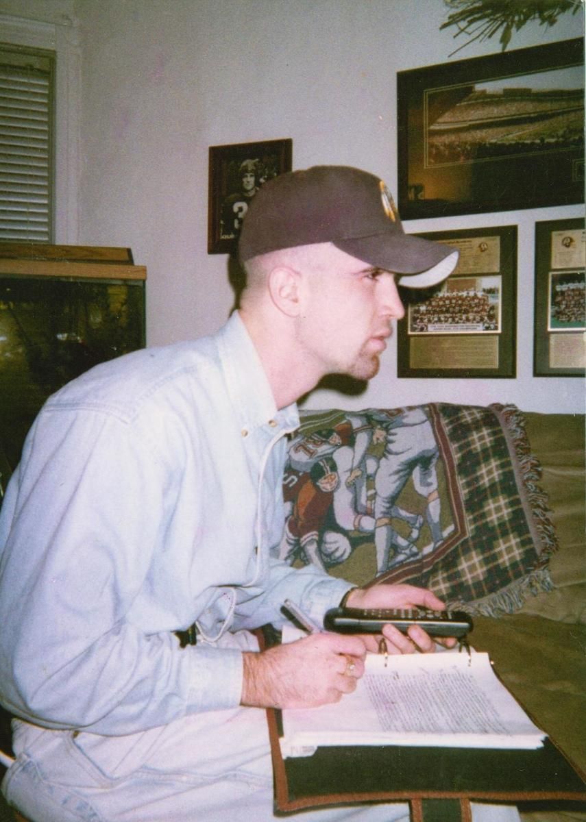 Kelly working on his draft evaluations as a senior in high school.