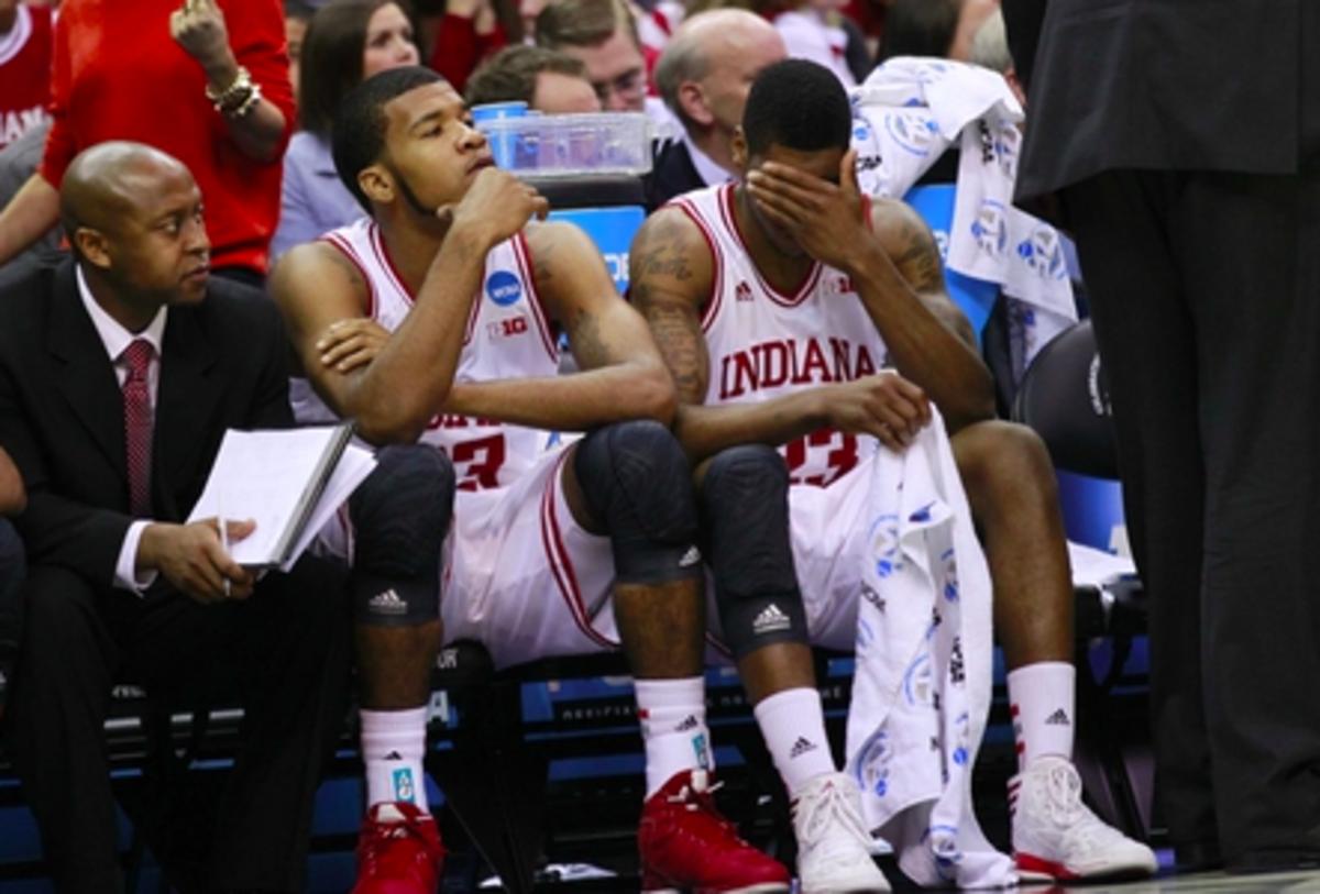 Remy Abell (right) covers his face near the end of Indiana's loss to Syracuse in 2013. (USA TODAY Sports)