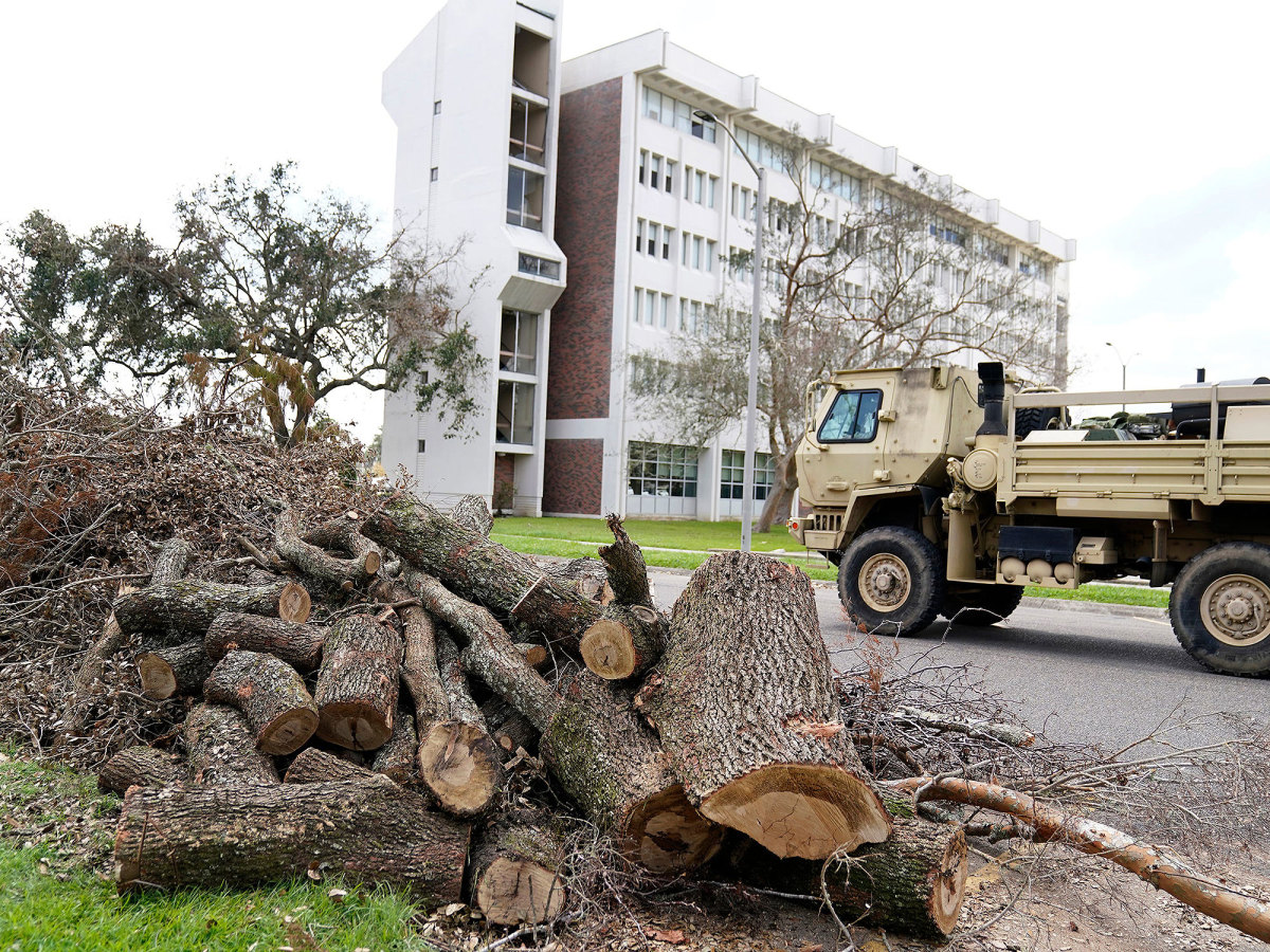 A National Guard vehicle makes its way through the campus of Nicholls State University.