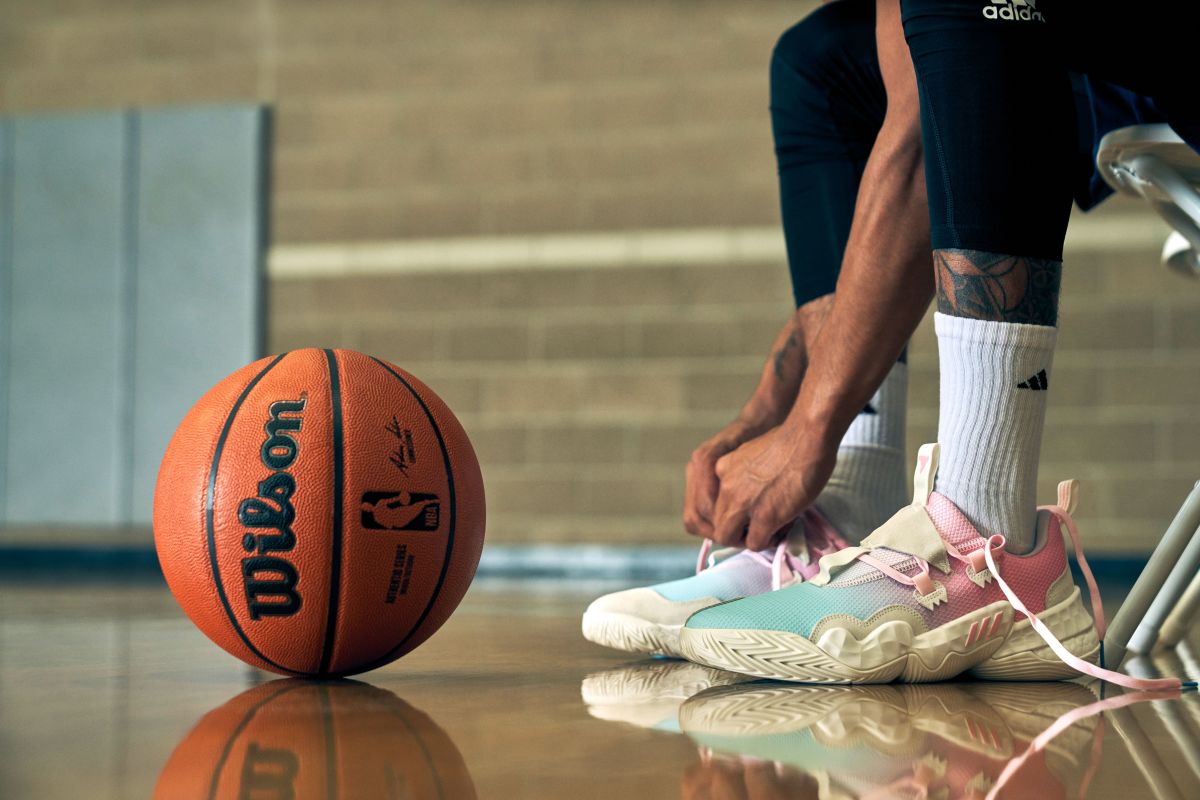 Trae Young lacing up the ICEE Cotton Candy colorway of the Adidas Trae Young 1