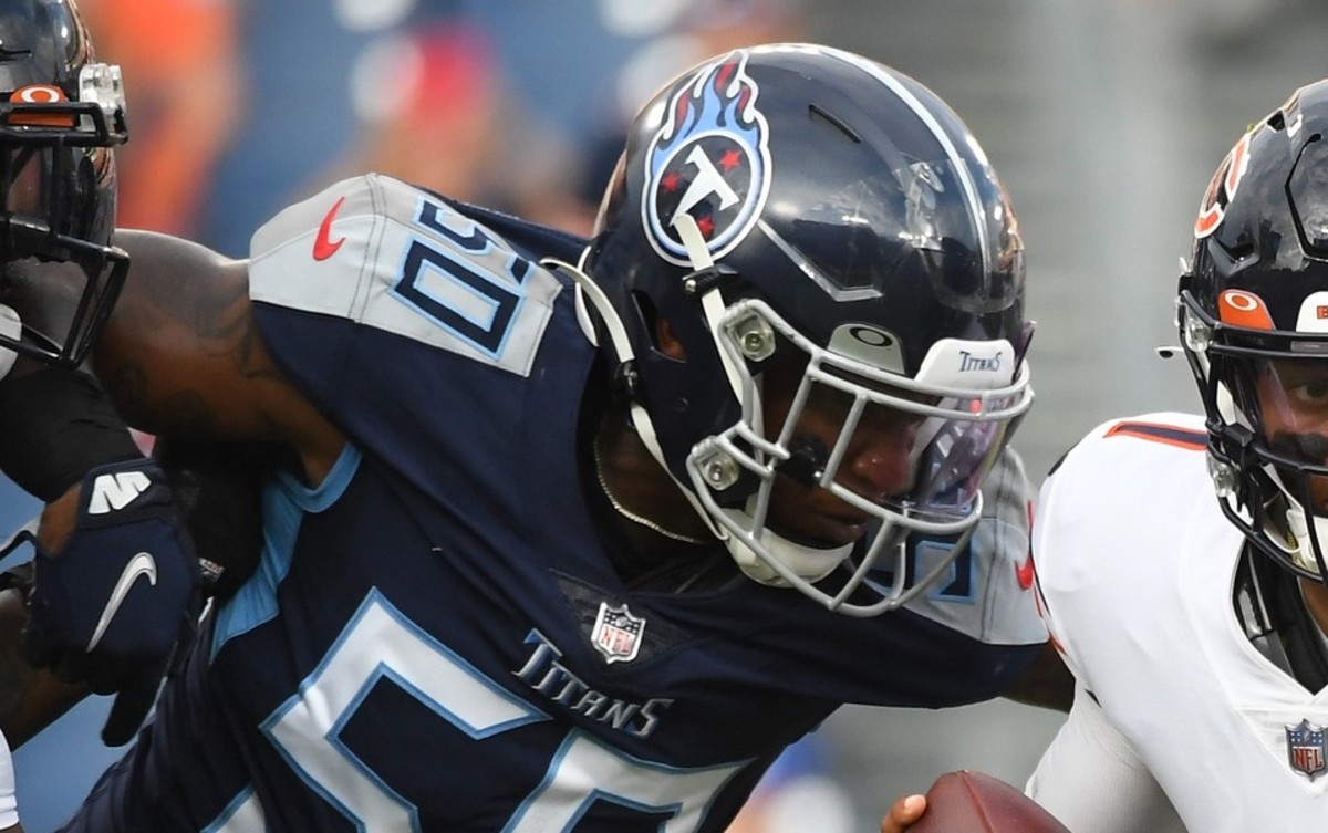 Chicago Bears quarterback Justin Fields (1) is sacked by Tennessee Titans linebacker Derick Roberson (50) during the first half at Nissan Stadium.