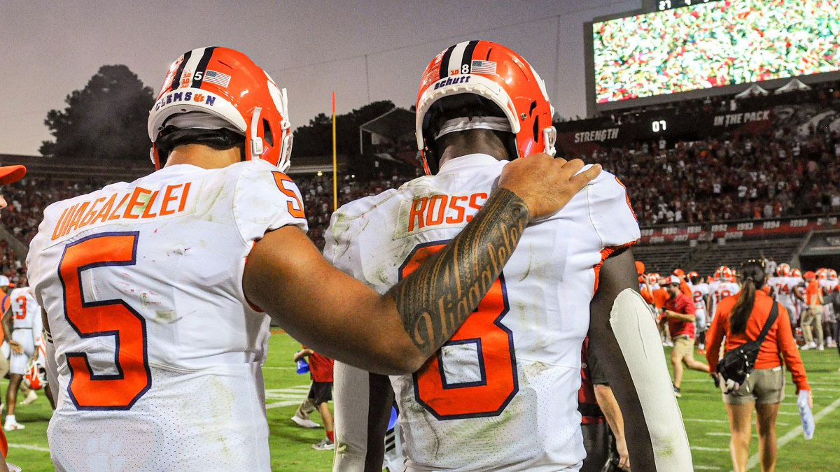 Justyn Ross is consoled by QB D.J. Uiagalelei after Clemson's loss to NC State