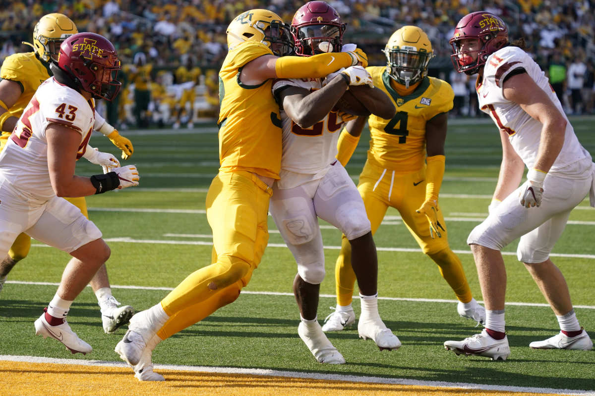 ep 25, 2021; Waco, Texas, USA; Iowa State Cyclones running back Breece Hall (28) runs in to the end zone as Baylor Bears linebacker Matt Jones (52) attempts to make the tackle in the second half at McLane Stadium.