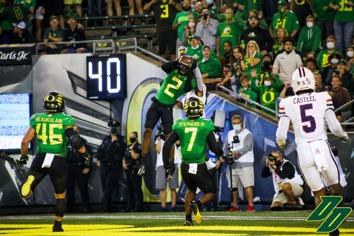 Mykael Wright (2) intercepts a pass intended for Stanley Berryhill (1) in the end zone.