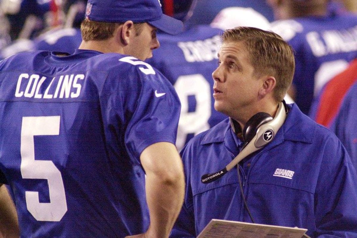 Former New York Giants assistant coach Sean Payton (right) goes over strategy with QB Kerry Collins (5). Credit: New York Post