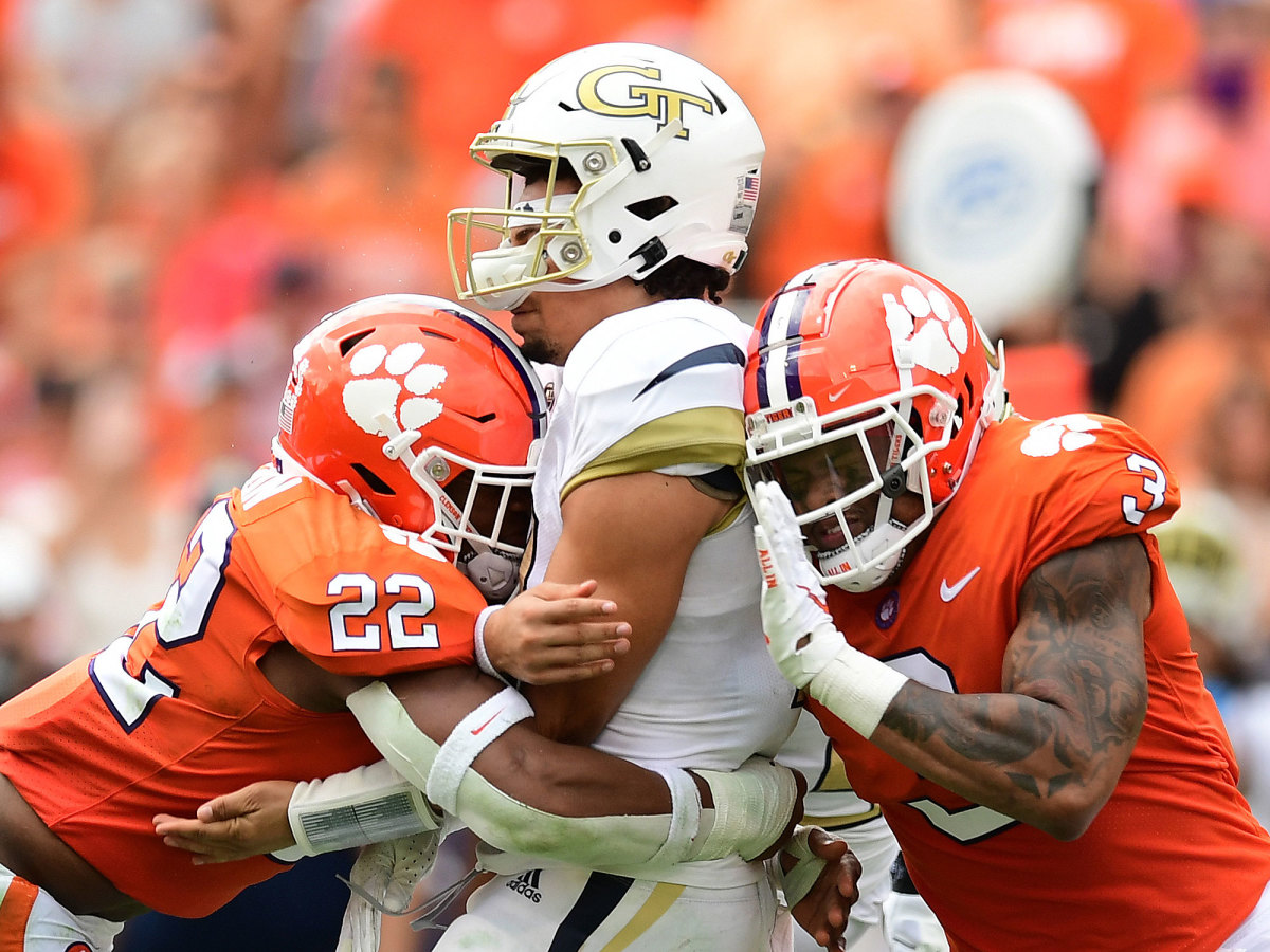 Clemson LB Trenton Simpson (22) is called for targeting after a hit on Georgia Tech QB Jordan Yates