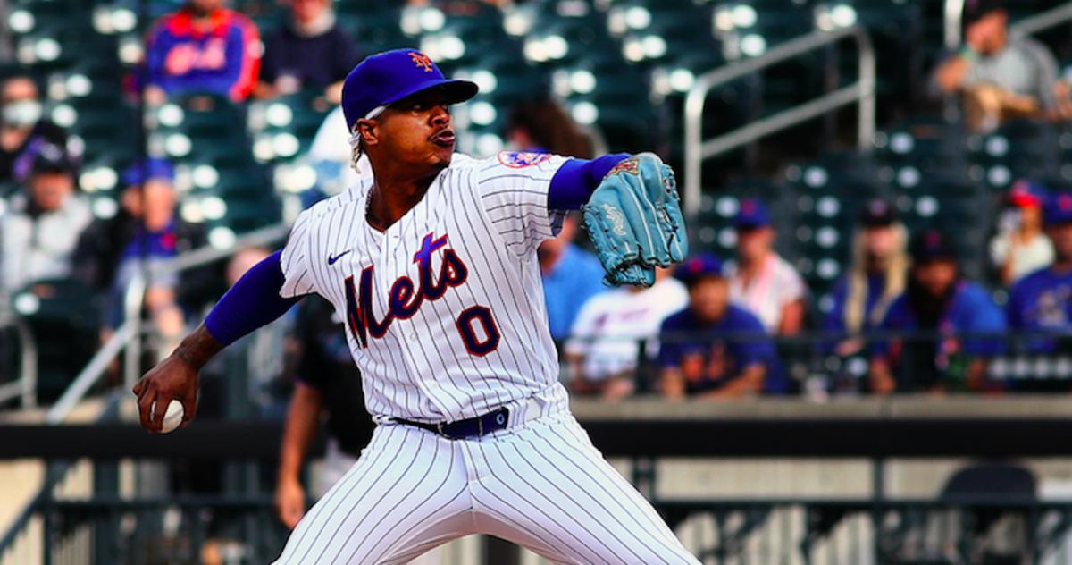 Sep 28, 2021; New York City, New York, USA; New York Mets starting pitcher Marcus Stroman (0) pitches against the Miami Marlins during the first inning of game one of a doubleheader at Citi Field.