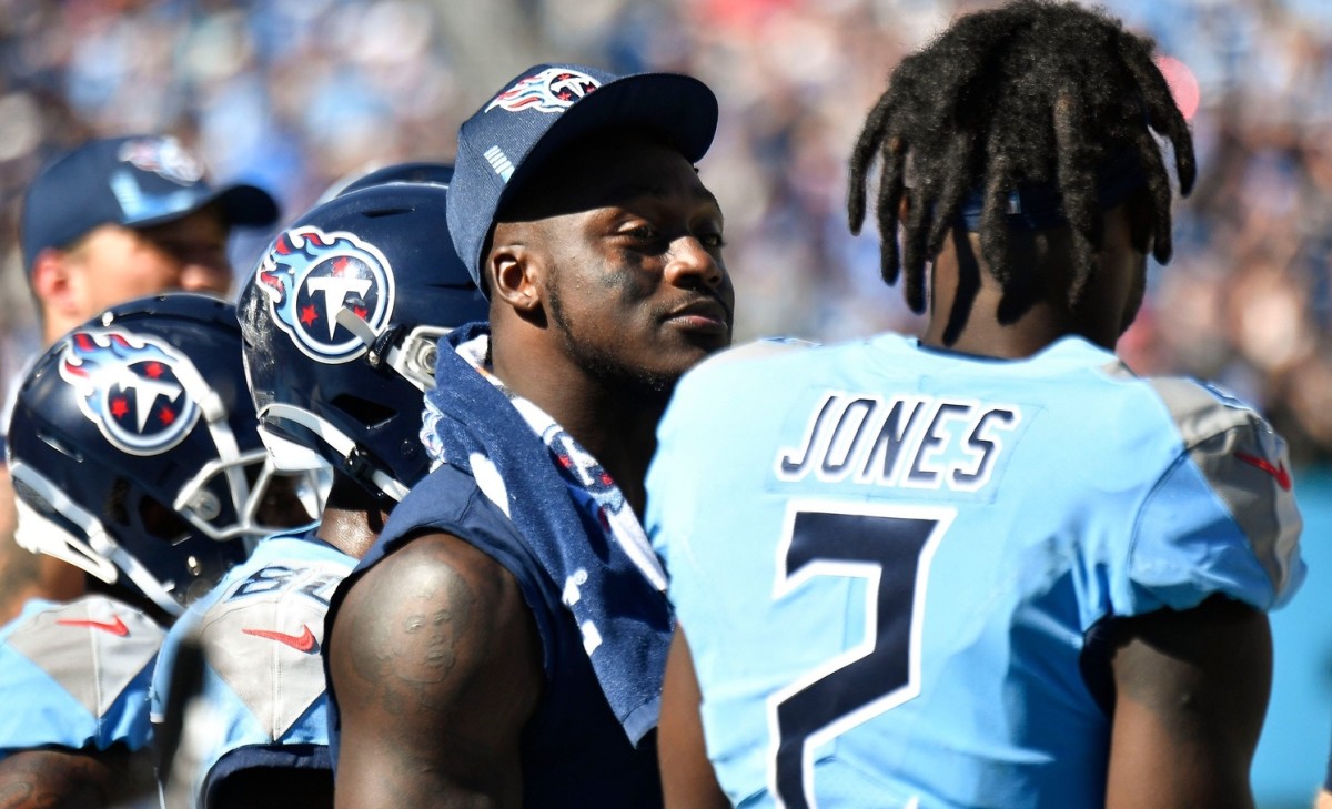 Tennessee Titans wide receiver A.J. Brown (11) and Tennessee Titans wide receiver Julio Jones (2) stand on the sideline after they were each injured during their game against the Colts at Nissan Stadium Sunday, Sept. 26, 2021 in Nashville, Tenn.