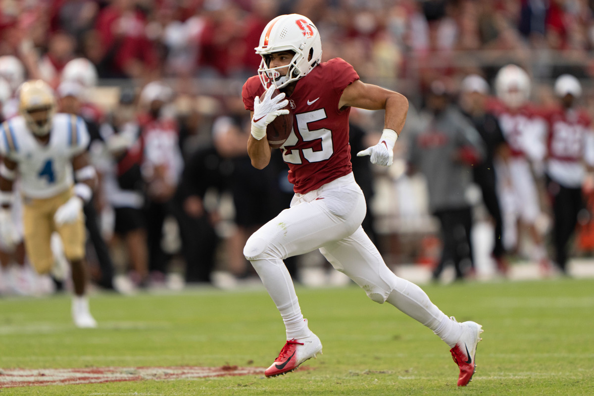 Stanford Cardinal wide receiver Bryce Farrell (25) runs for a touchdown during the third quarter against the UCLA Bruins.
