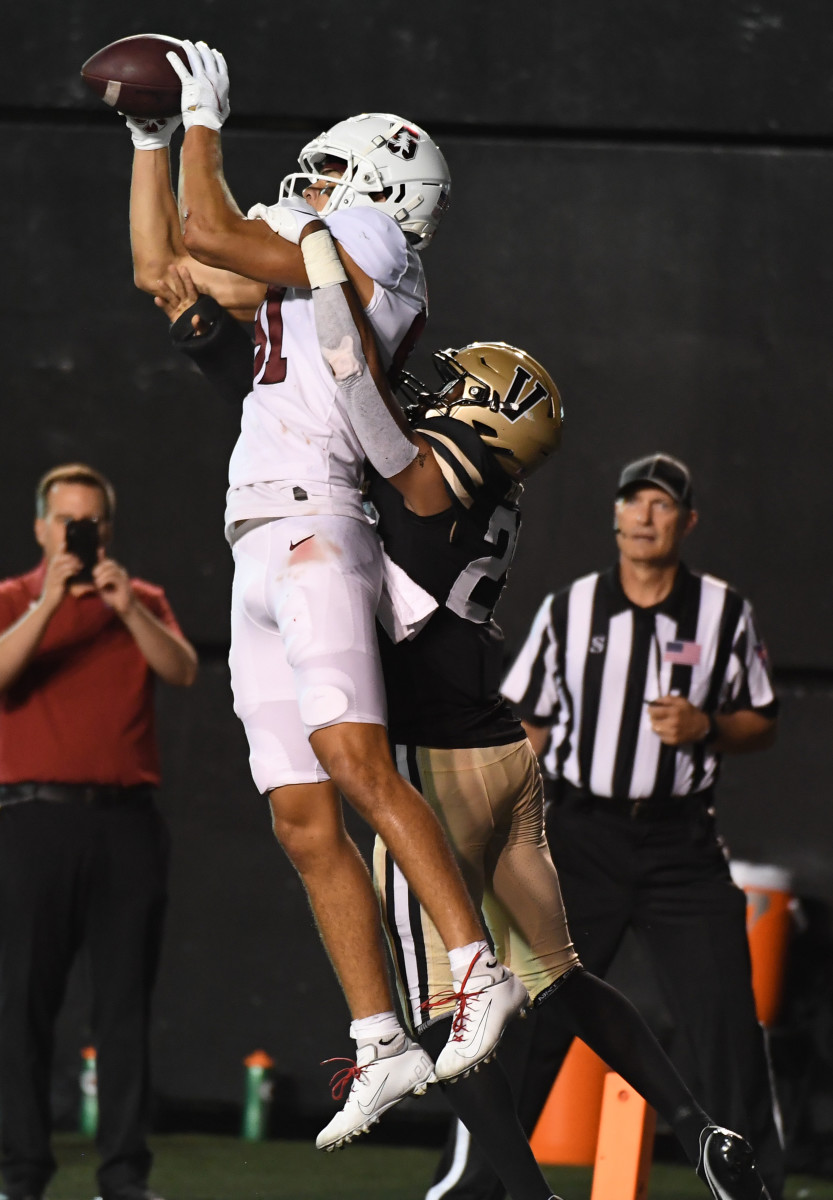 Stanford Cardinal wide receiver Brycen Tremayne (81) catches a touchdown pass as he is defended by Vanderbilt Commodores cornerback BJ Anderson (26).