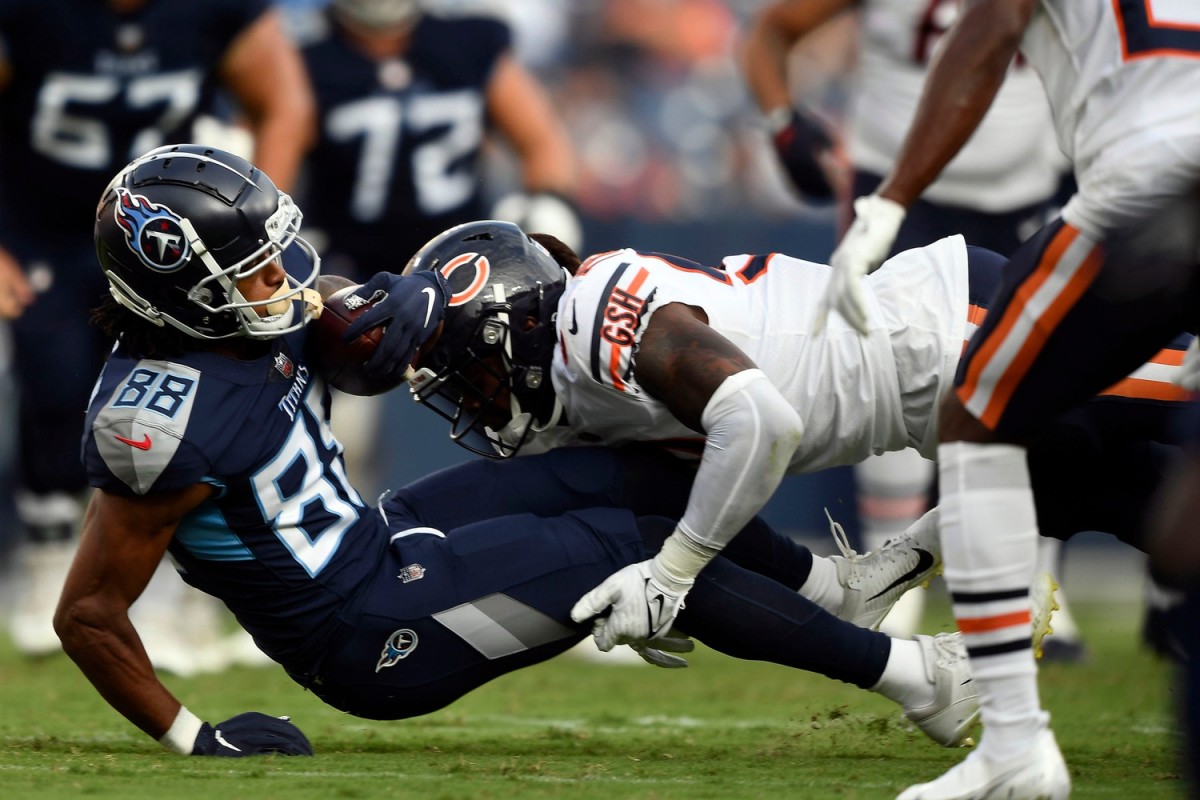 Tennessee Titans wide receiver Marcus Johnson (88) picks up a first down again the Bears during the first quarter of an NFL preseason game at Nissan Stadium Saturday, Aug. 28, 2021 in Nashville, Tenn.