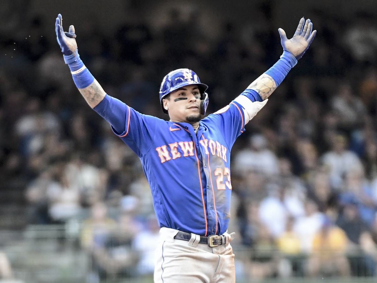 Sep 26, 2021; Milwaukee, Wisconsin, USA; New York Mets shortstop Javier Baez (23) reacts after hitting a double to drive in 2 runs in the fourth inning against the Milwaukee Brewers at American Family Field.