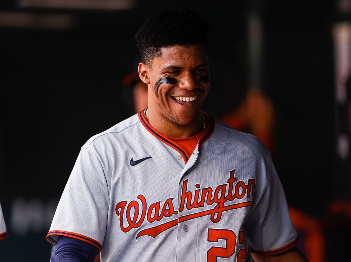 Washington Nationals right fielder Juan Soto (22) in the dugout in the first inning against the Colorado Rockies at Coors Field.