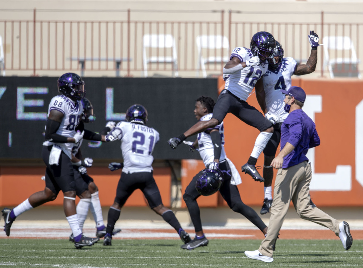 Oct 3, 2020; Austin, TX, USA; TCU Horned Frogs celebrate a win over the Texas Longhorns 33-31 in a NCAA college football game at Darrell K Royal-Texas Memorial Stadium.