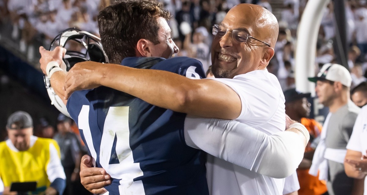 Penn State coach James Franklin (right) hugs quarterback Sean Clifford after the Nittany Lions defeated Auburn 28-20 on Sept. 18. (Dan Rainville/USA TODAY Sports.)