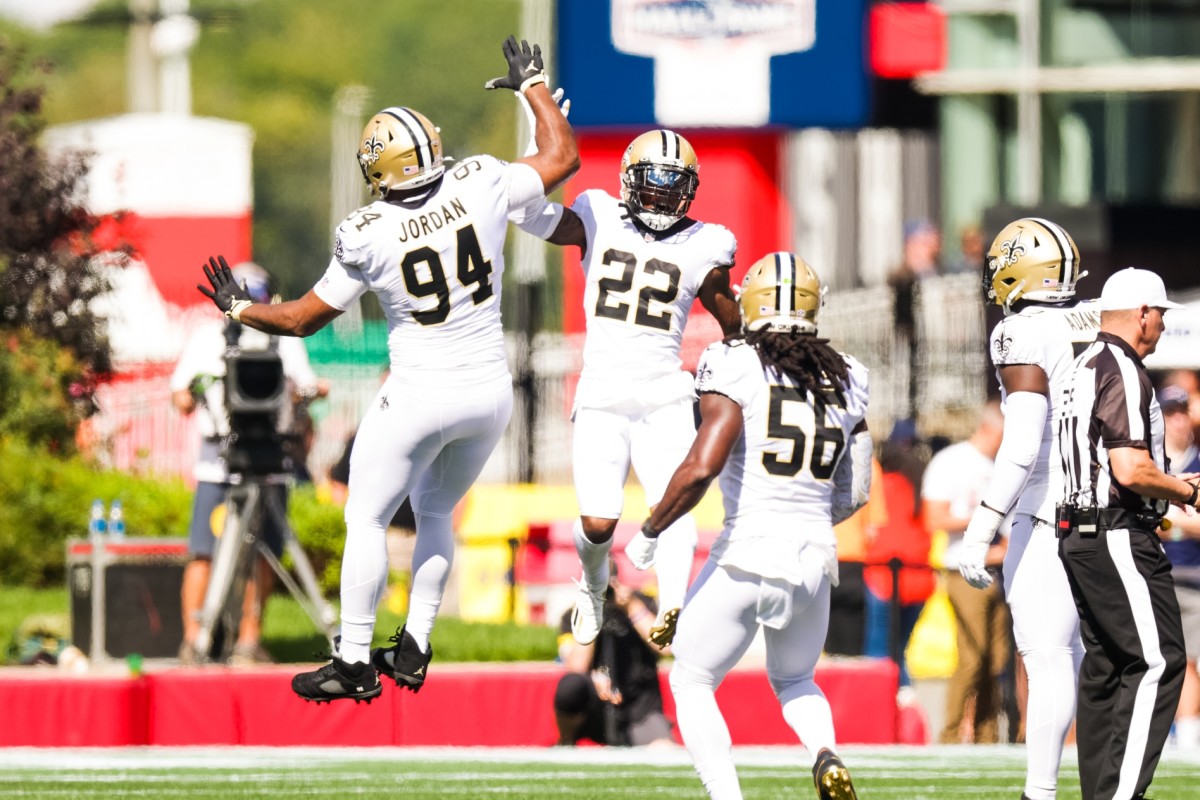 Sep 26, 2021; Foxborough, Massachusetts, USA; New Orleans Saints safety Chauncey Gardner-Johnson (22) and defensive end Cameron Jordan (94) react to a policy against New England Patriots during the first half at Gillette Stadium.