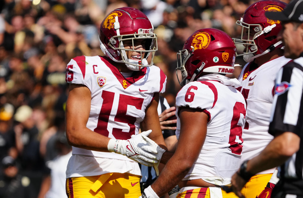 USC Trojans wide receiver Drake London (15) and running back Vavae Malepeai (6) celebrate a score in the second half against the Colorado Buffaloes.
