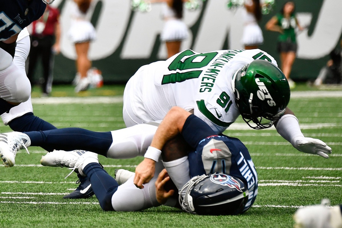 Tennessee Titans quarterback Ryan Tannehill (17) is sacked by New York Jets defensive end John Franklin-Myers (91) during the second quarter at MetLife Stadium Sunday, Oct. 3, 2021 in East Rutherford, N.J.
