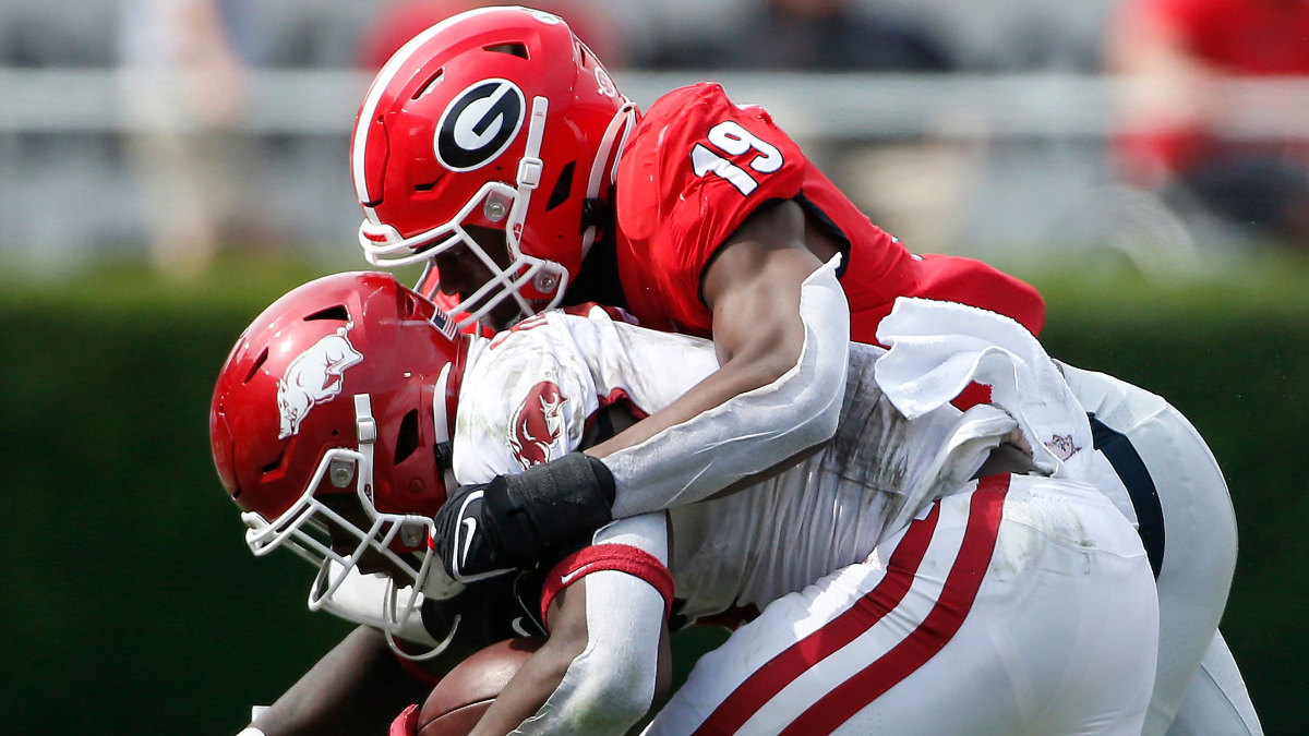 Georgia's Adam Anderson tackles an Arkansas player