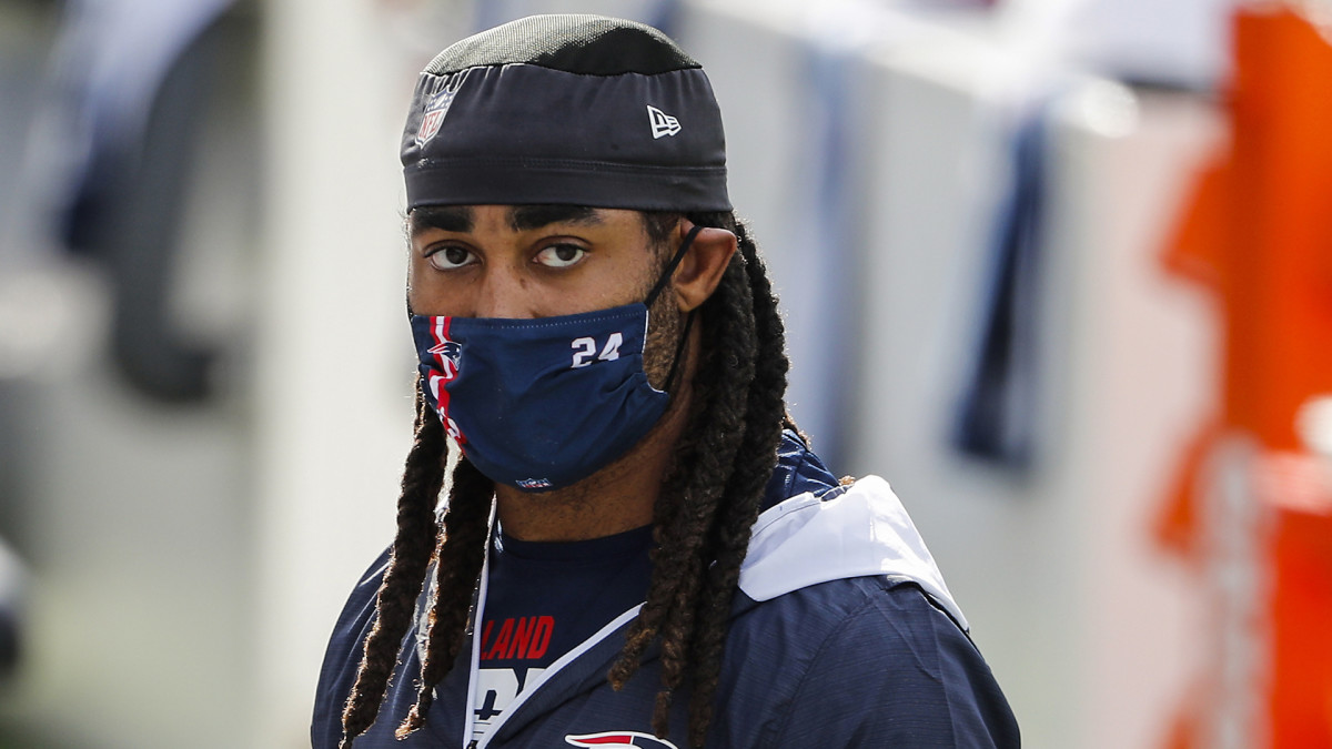 Stephon Gilmore on the sideline during a Patriots game in 2020