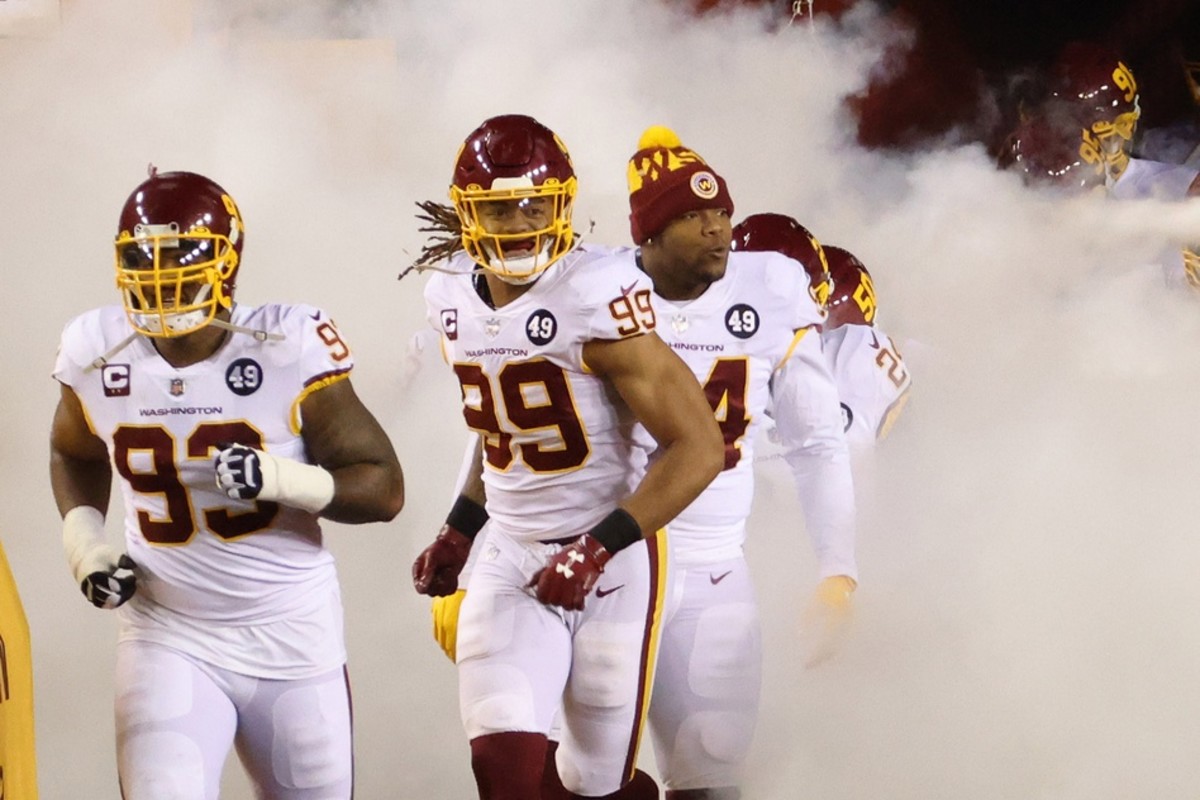 Washington defensive tackle Jonathan Allen (93), defensive end Chase Young (99), and nose tackle Daron Payne (94) run onto the field. Mandatory Credit: Geoff Burke-USA TODAY