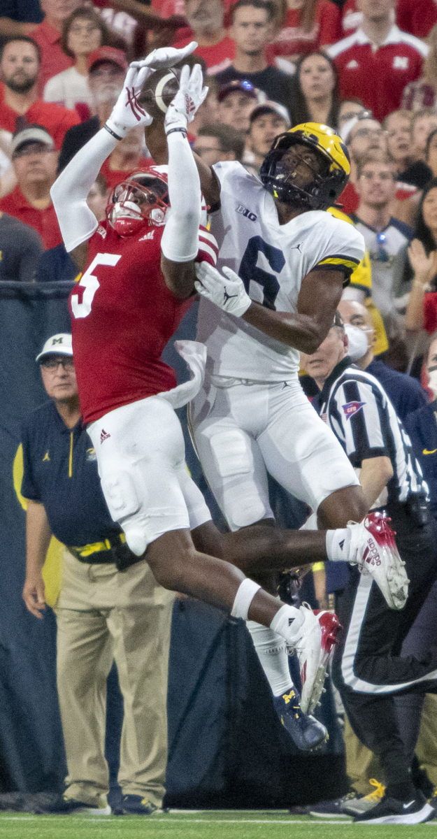 Nebraska cornerback Cam Taylor-Britt breaks up a pass intended for Michigan's Cornelius Johnson in the first quarter.