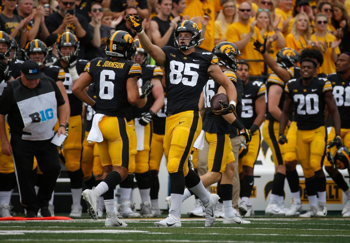Iowa freshman tight end Luke Lachey signals first down after pulling down a pass reception in the first quarter against Penn State at Kinnick Stadium in Iowa City, Iowa, on Saturday, Oct. 9, 2021