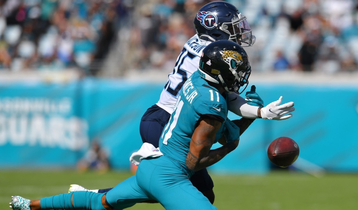 Tennessee Titans cornerback Chris Jackson (35) breaks up a pass intended for Jacksonville Jaguars wide receiver Marvin Jones Jr. (11) during late third quarter action. The Jacksonville Jaguars hosted the Tennessee Titans at TIAA Bank Field in Jacksonville, Florida, October 10, 2021.