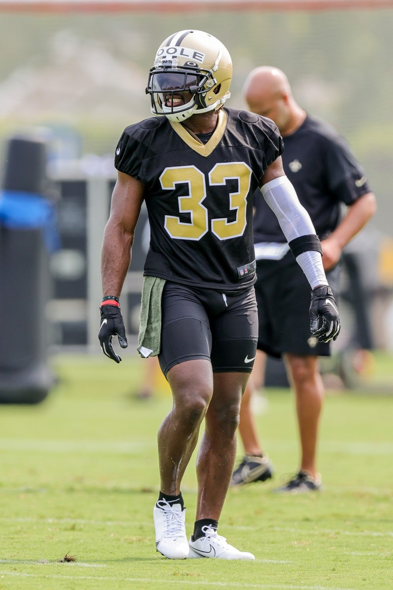 New Orleans Saints cornerback Brian Poole (33) performs defensive drills during a training camp session. Mandatory Credit: Stephen Lew-USA TODAY 