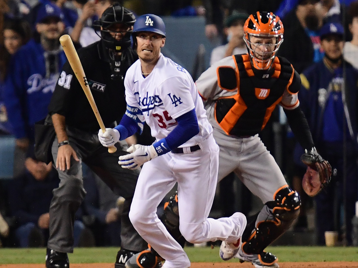 Los Angeles Dodgers center fielder Cody Bellinger (35) hits in to a fielders choice to San Francisco Giants first baseman Darin Ruf (33) in the third inning during game four of the 2021 NLDS