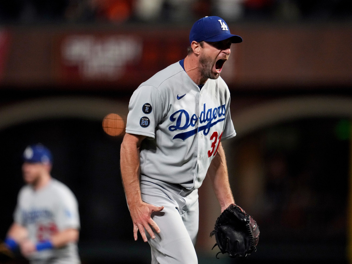 Oct 14, 2021; San Francisco, California, USA; Los Angeles Dodgers starting pitcher Max Scherzer (31) reacts after defeating the San Francisco Giants in game five of the 2021 NLDS at Oracle Park.