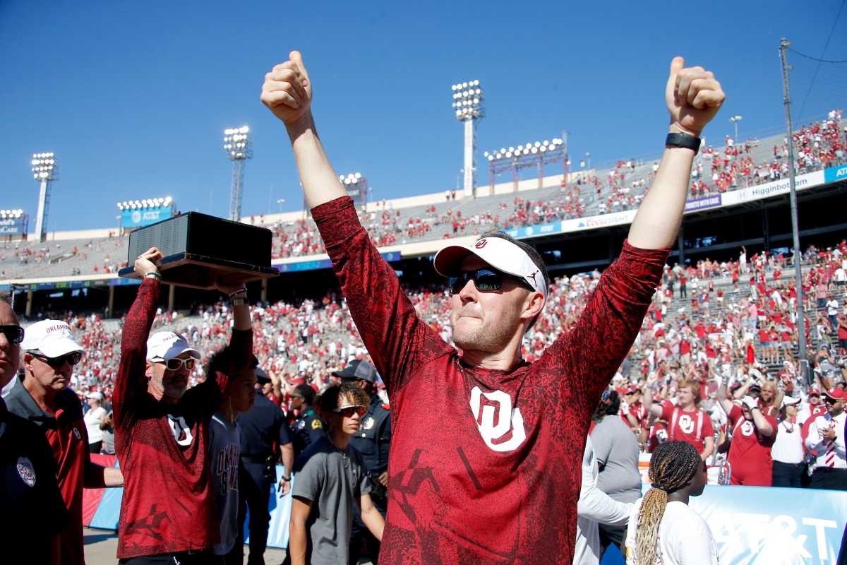 OU coach Lincoln Riley celebrates after the Red River Showdown, a 55-48 win against Texas, on Saturday at the Cotton Bowl in Dallas. Ou Vs Texas