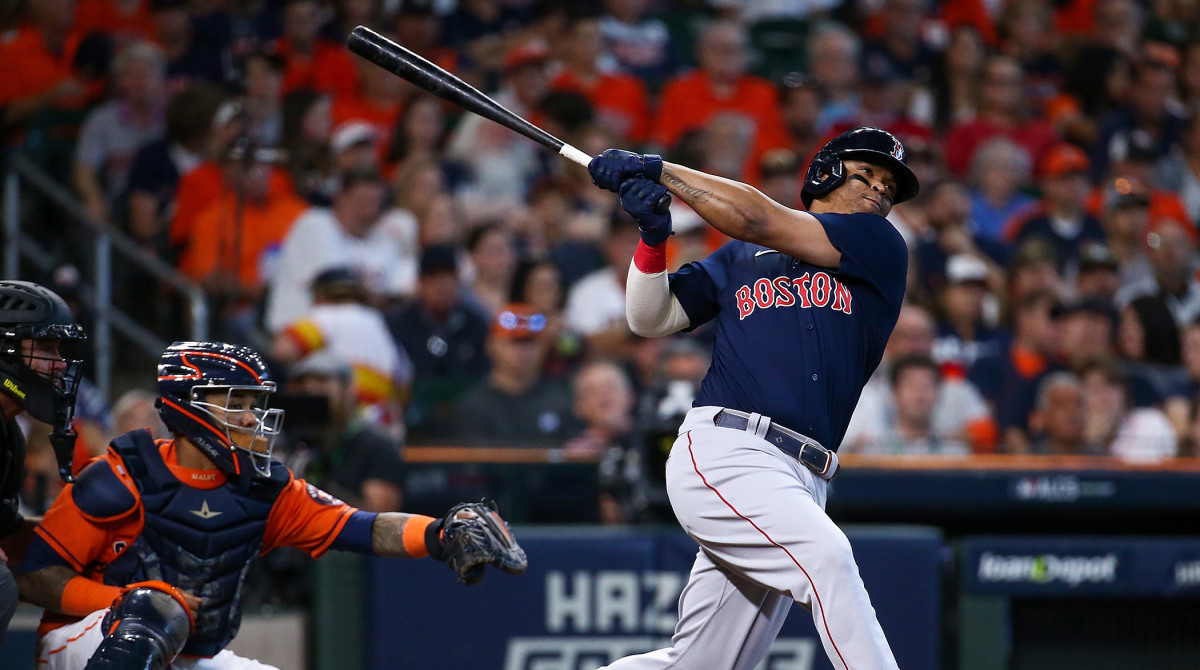 Oct 16, 2021; Houston, Texas, USA; Boston Red Sox third baseman Rafael Devers (11) hits a grand slam against the Houston Astros during the second inning in game two of the 2021 ALCS at Minute Maid Park.