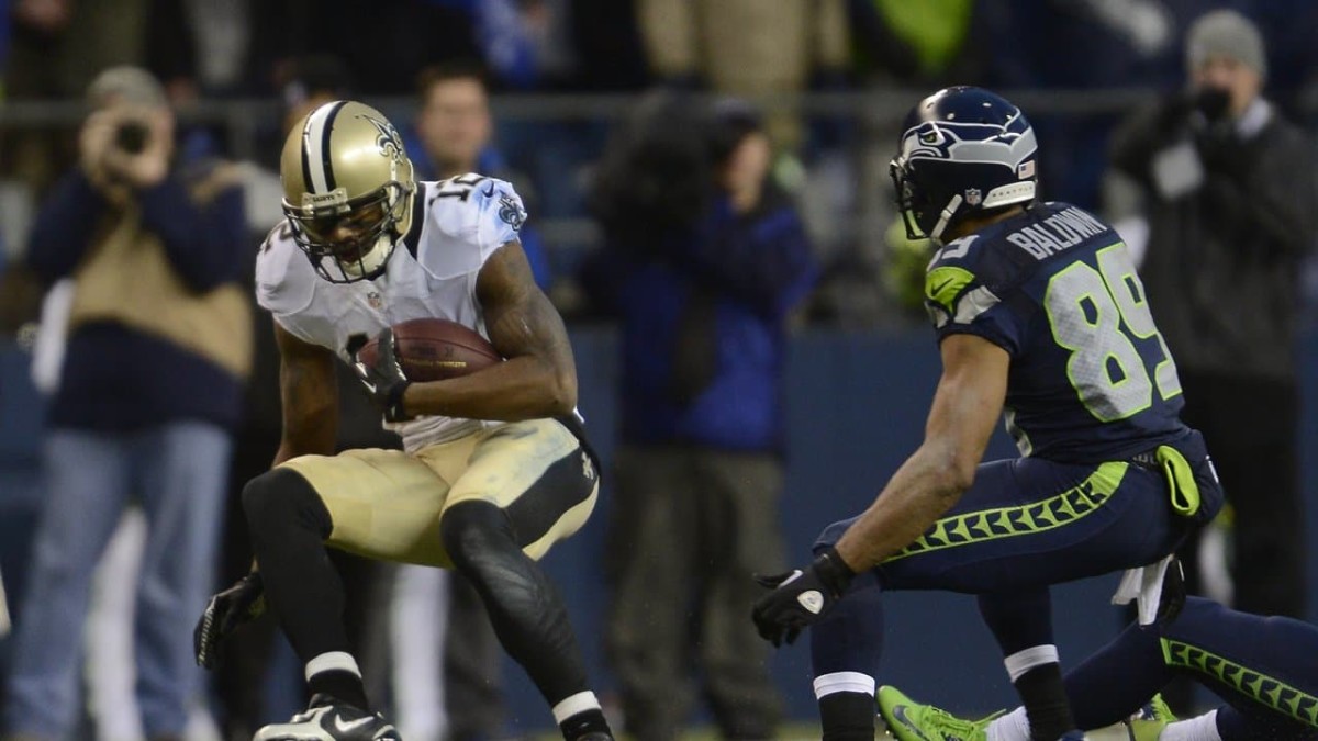 New Orleans Saints receiver Marques Colston secures the ball against the Seattle Seahawks in a 2014 playoff game. Credit: neworleanssaints.com