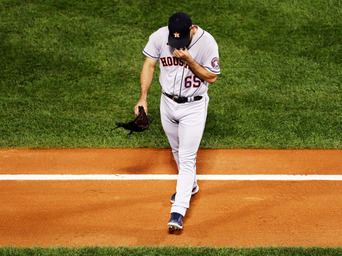 Oct 18, 2021; Boston, Massachusetts, USA; Houston Astros starting pitcher Jose Urquidy (65) walks off of the field after being taken out of the game during the second inning in game three of the 2021 ALCS against the Boston Red Sox at Fenway Park.