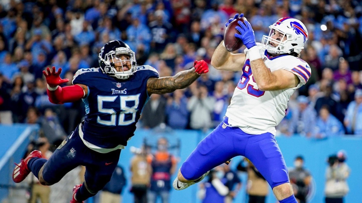 Bills TE Tommy Sweeney hauls in the first touchdown pass of his career after eluding Titans' Harold Landry.