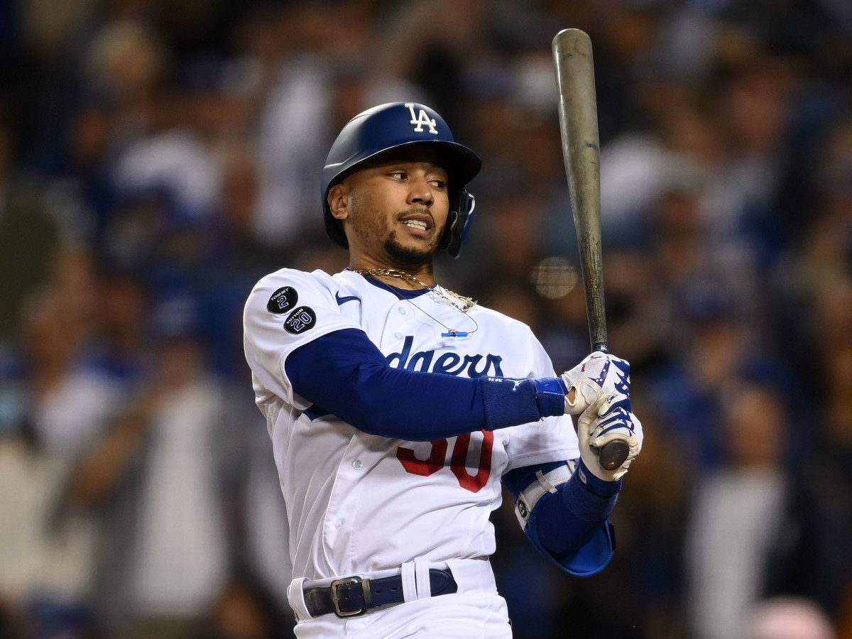 Los Angeles Dodgers right fielder Mookie Betts (50) strikes out in the eighth inning against the Atlanta Braves during game four of the 2021 NLCS at Dodger Stadium.