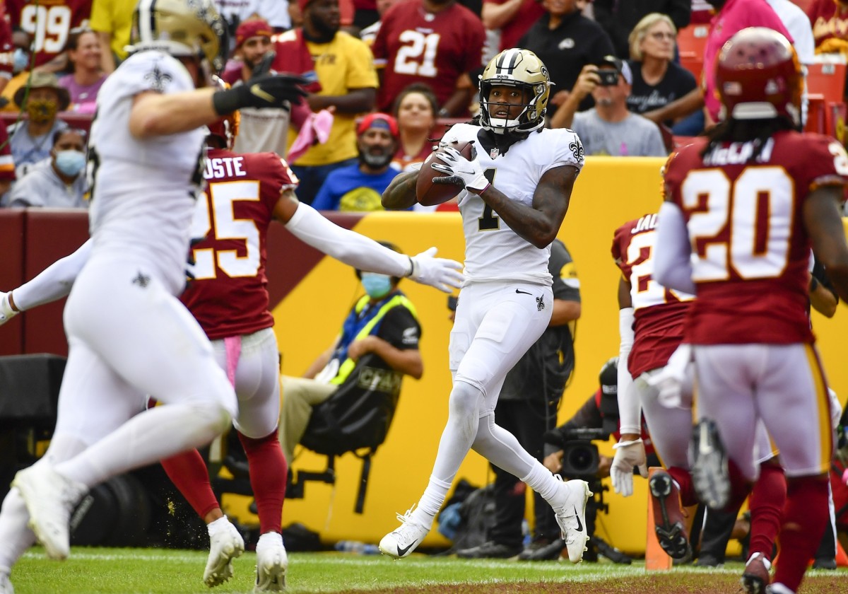 New Orleans Saints receiver Marquez Callaway (1) scores a touchdown as Washington cornerback Benjamin St-Juste (25) and safety Bobby McCain (20) look on. Mandatory Credit: Brad Mills-USA TODAY 