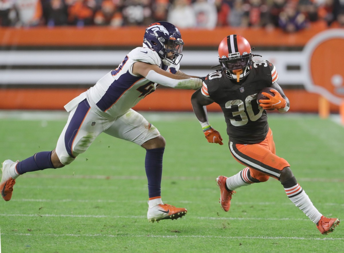 Cleveland Browns running back D'Ernest Johnson gets away from Denver's Justin Strnad on Thursday, Oct. 21, 2021 in Cleveland, Ohio, at FirstEnergy Stadium. The Browns won the game 17-14. [Phil Masturzo/ Beacon Journal] Browns5
